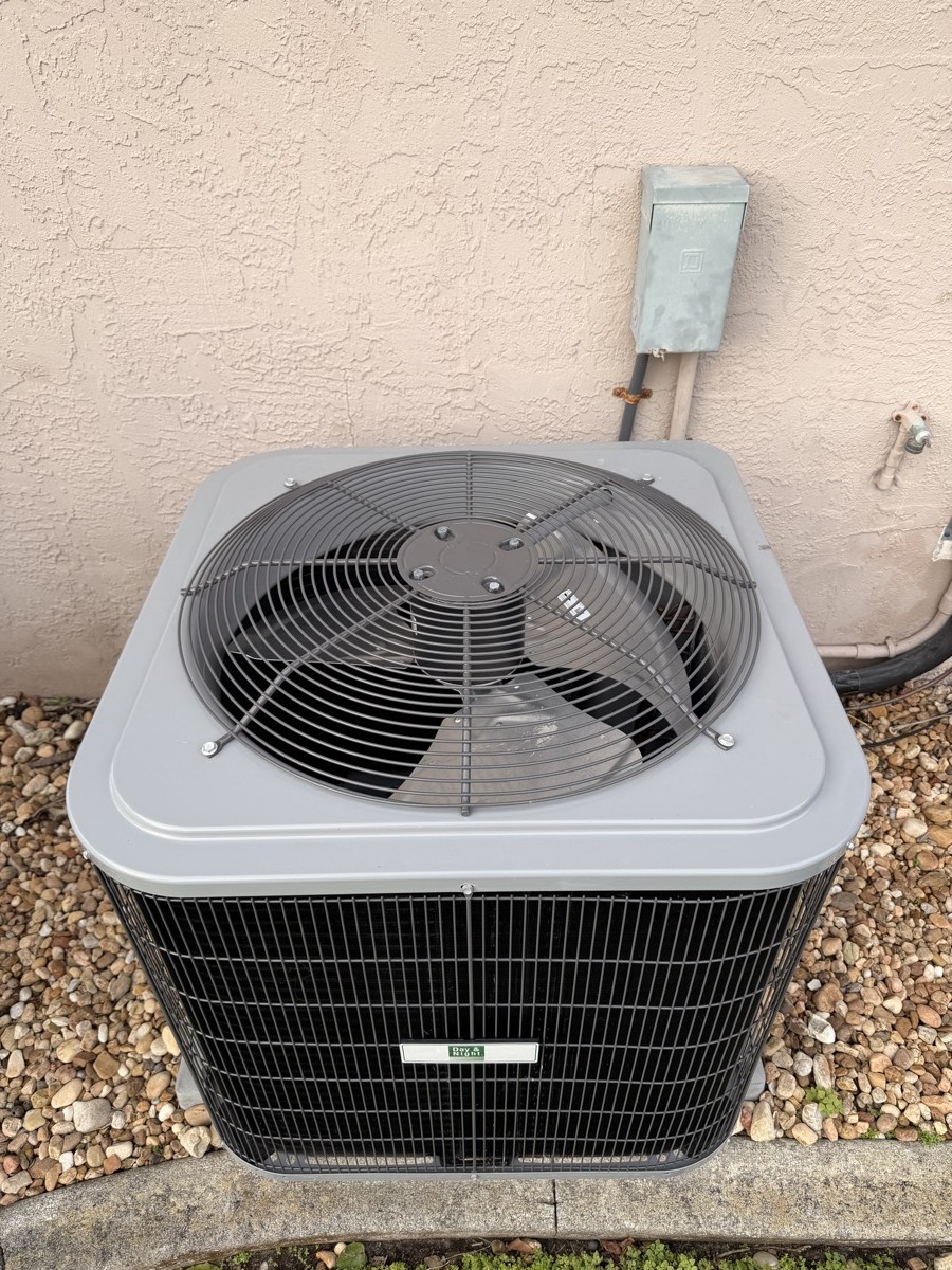A photo of an outdoor AC unit on a phone camera