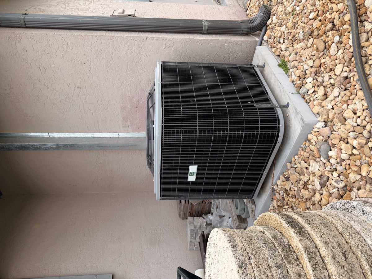 A new outdoor AC unit installed beside a Florida home